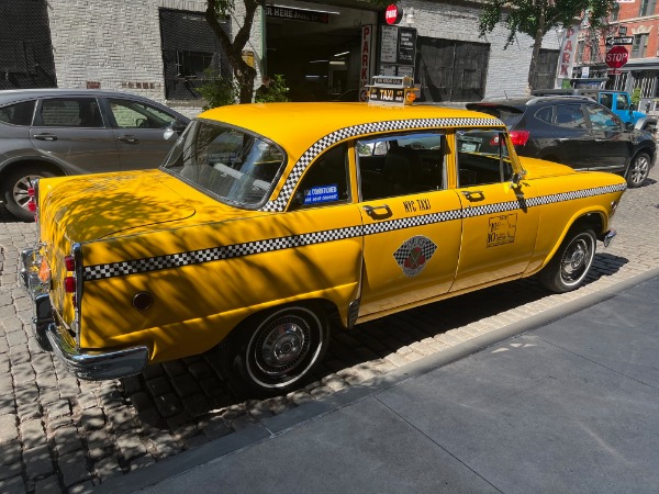 Used-1956-Checker-Taxi-cab-Yellow-Livery-Taxicab-Vintage-Cab-Vintage-Taxi